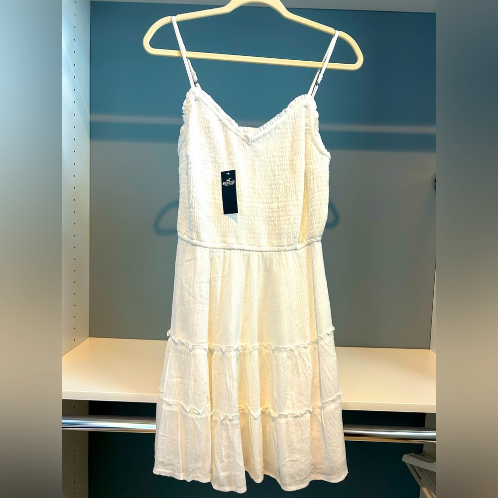 NWT Hollister white dress. Tiered. Size large. Lightly lined. Brand new!